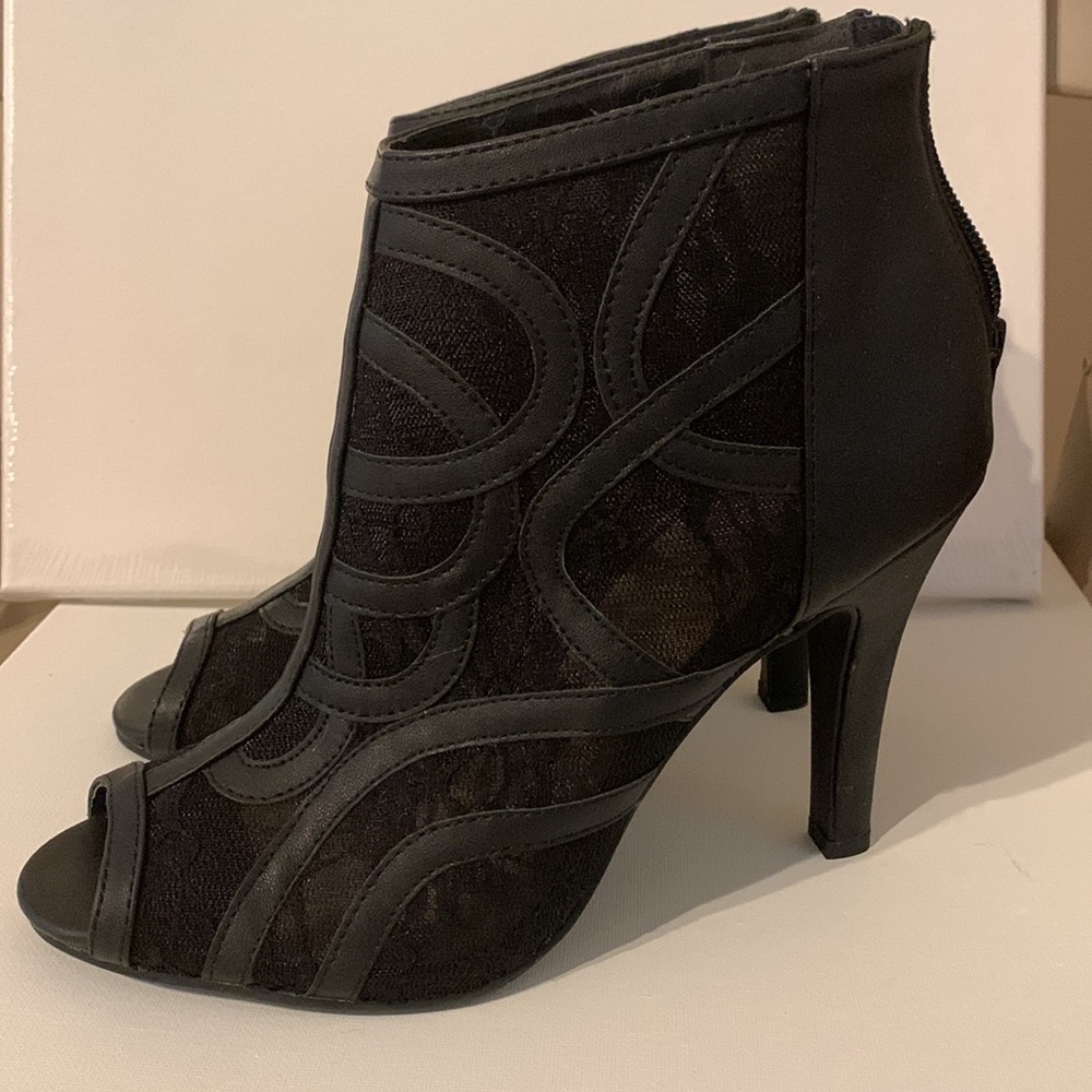Black and lace booties with peep toe